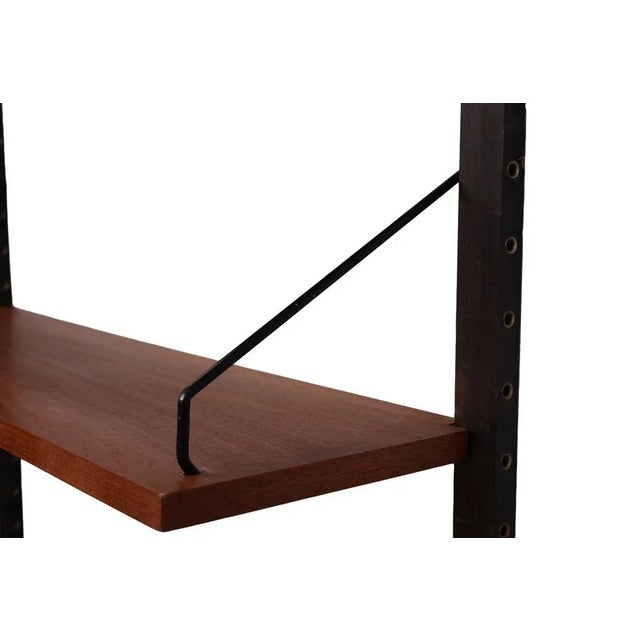 Iconic Teak wall system Designed by Poul Cadovius for Royal system . Denmark .This is a modular system so all the shelves...