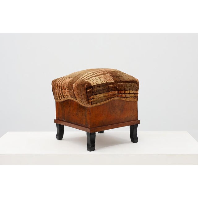 A refined pair of Italian Art Deco stools from the 1920s, crafted in richly grained walnut and professionally restored to...