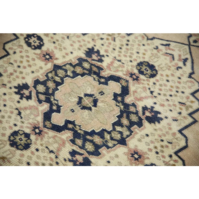 Introducing a one-of-a-kind vintage Turkish hand-knotted wool rug, carefully crafted by skilled artisans using traditional...
