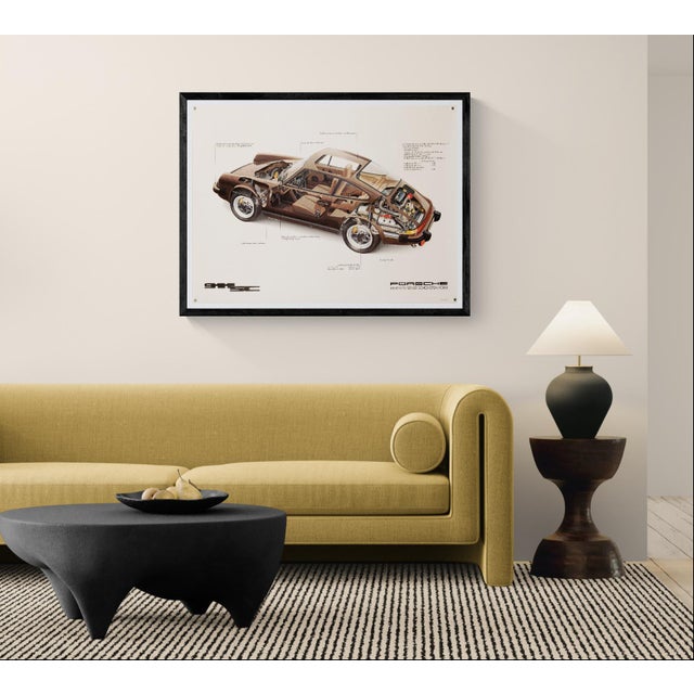 This original vintage poster features a detailed cutaway drawing of the iconic Porsche 911 SC. Illustrated by Studio Farr,...
