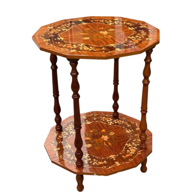 This striking antique octagonal side table showcases the timeless beauty of mahogany combined with exquisite inlaid floral...