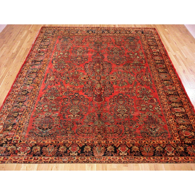 Vintage Persian Sarouk Oriental rug, circa 1920, Room size. A vintage Persian Sarouk oriental rug, size 11'7" x 9'2",...