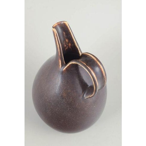 Eva Stæhr-Nielsen for Saxbo, Denmark, large jug, mid-20th century. Rare and large jug in stoneware with a characteristic...