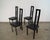 Set of four Post Modern dining chairs for sale. They are all in excellent condition, and have a great design to them. They...