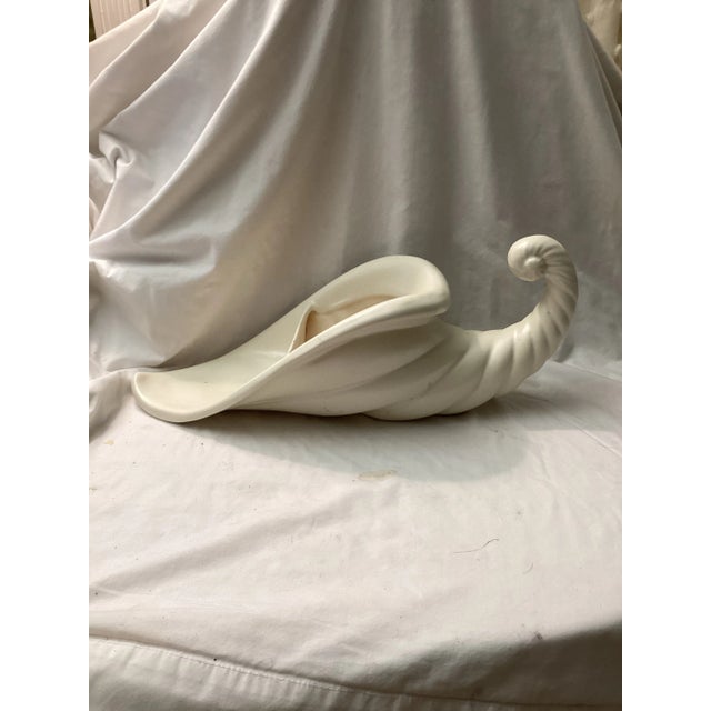 This graceful, ceramic cornucopia planter captures the timeless symbol, symbolism of abundance and prosperity. Crafted...