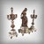 This Louis XVI style mantelpiece set comprises a central clock and a pair of matching five-light candelabra. The clock...