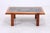 Vintage teak coffee table with an intricately inlaid slate top. The sturdy wooden frame, rounded edges, and the...