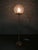 Sculptural space age floor lamp produced in kamenický šenov, czechoslovakia, during the 1970s, featuring a tall brass-...