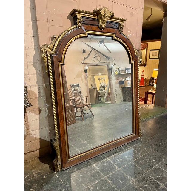 A large American Gilded Age Pier Glass Mirror, circa 1900. Overall size: 61" wide x 75" high ( 77" H to top of central...