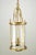 French Neoclassical style ceiling lantern with a brass frame and clear cylindrical glass shade. The chain is made of...