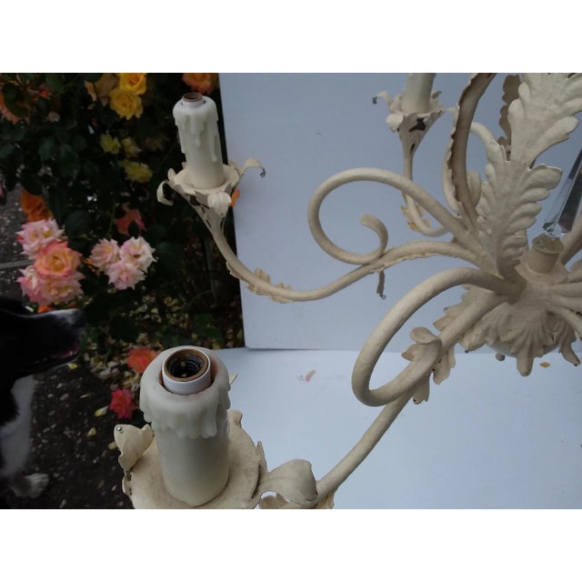 Classic 80’s Scrolling Iron Chandelier With off white hand painted finish. This was holes for Crystals if you want to...