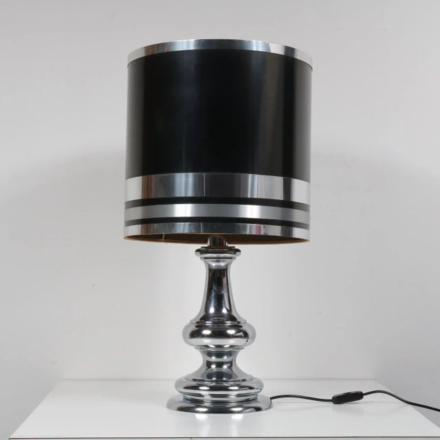 This wonderful large table lamp is made of beautiful, high-quality chrome-plated metal. The cylinder-shaped hood is made...
