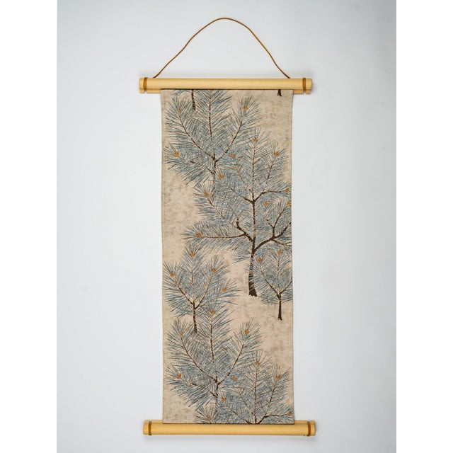 Cream silk. One pine branch. The stillness of a winter forest on the wall. The Eternal Pine is mounted from a hand-painted...