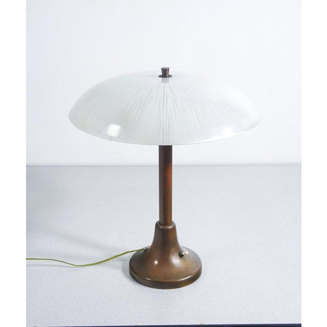 Bedside lamp art deco bronze base and glass lampshade. three lights period early 20th century materials bronze base,...
