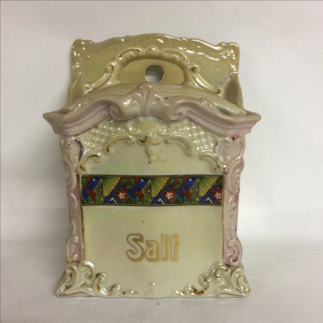 I love Lusterware. And the contrast of the "Asian style" decorative band of color against the paler background is...