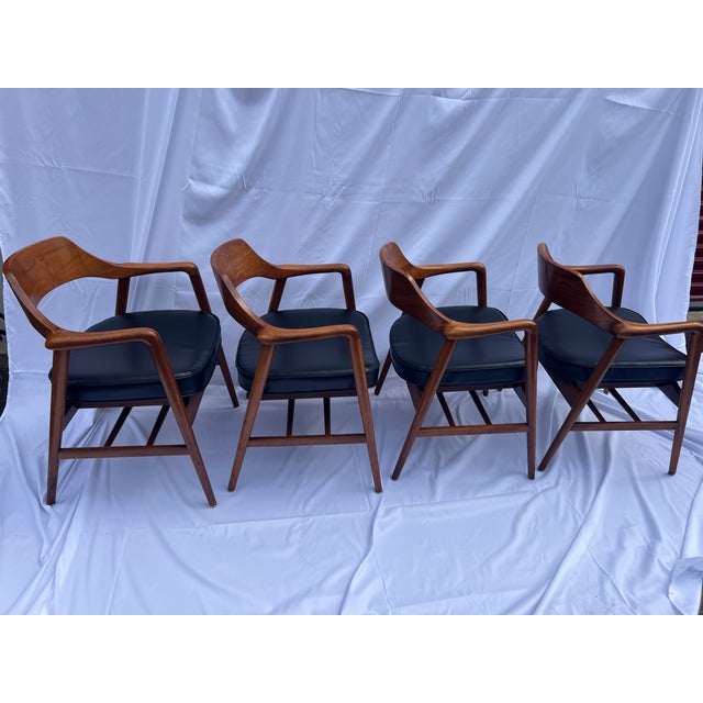 For sale is a set of 4 Gunlocke Walnut Black Faux Leather Vinyl Mid Century Modern Dining Chairs. Unsure if the seat...