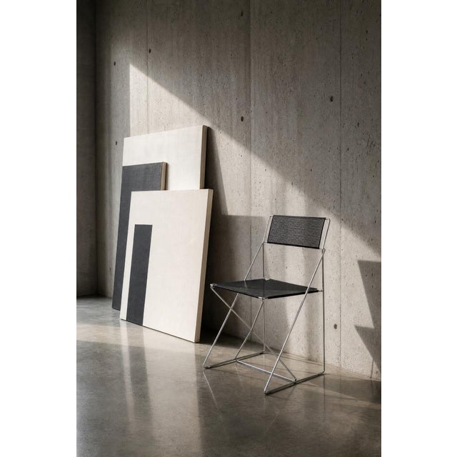 This rare set of four stacking X-Line chairs was designed in 1977 by Niels Jørgen Haugesen and produced by Hybodan A/S in...