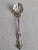 A lovely shell motif solid sterling silver preserve spoon in the "King Edward" pattern by Whiting Manufacturing Co. The...