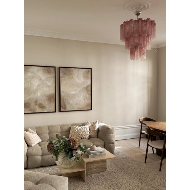 Colorful bold murano chandelier with glass tubes in pink tones with a marble pattern. Tronchi formed glass prisms in...