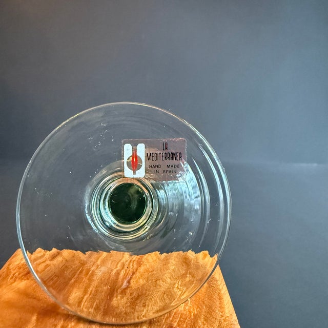 Set of two Spanish green glass candle holders, 6'' tall. Made by La Mediterranea with the stickers on the bottom. They are...