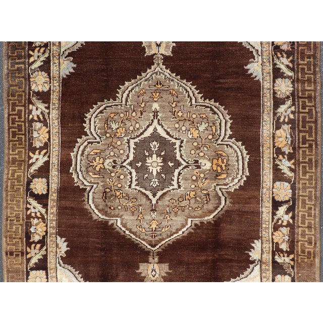 Brown Mid 20th Century Brown Background Floral Medallion Vintage Turkish Kars Rug in Ivory and Taupe For Sale - Image 8 of 14