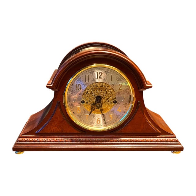 A beautiful Howard Miller 630-200 Barrett Mantel Clock. Features decorative egg-and-dart molding that wraps around the...