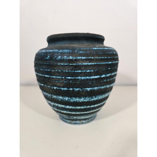An elegant ceramic vase from the renowned Accolay workshop, the "Gauloise" model, characteristic of French production from...