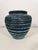 An elegant ceramic vase from the renowned Accolay workshop, the "Gauloise" model, characteristic of French production from...