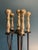 Very nice sturdy set of 4 fireplace tools and stand up holder. The set includes a brush, poker, shovel, and log grabber....