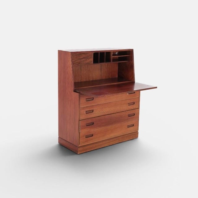 Secretary desk model 81 designed by arne wahl iversen and produced by vinde møbelfabrik in denmark. the piece is executed...