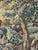 A finely woven 18th century Franco-Flemish verdure tapestry, featuring a bird perched within a lush flowering Baroque...