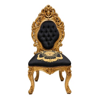French Baroque Style Accent Chair – Gold Leaf Carved Frame With Black Tufted Upholstery & Medallion Detail For Sale