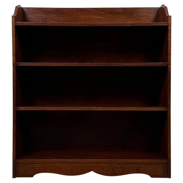 A handsome and well-crafted 20th-century open bookcase, beautifully constructed in mahogany and distinguished by its...