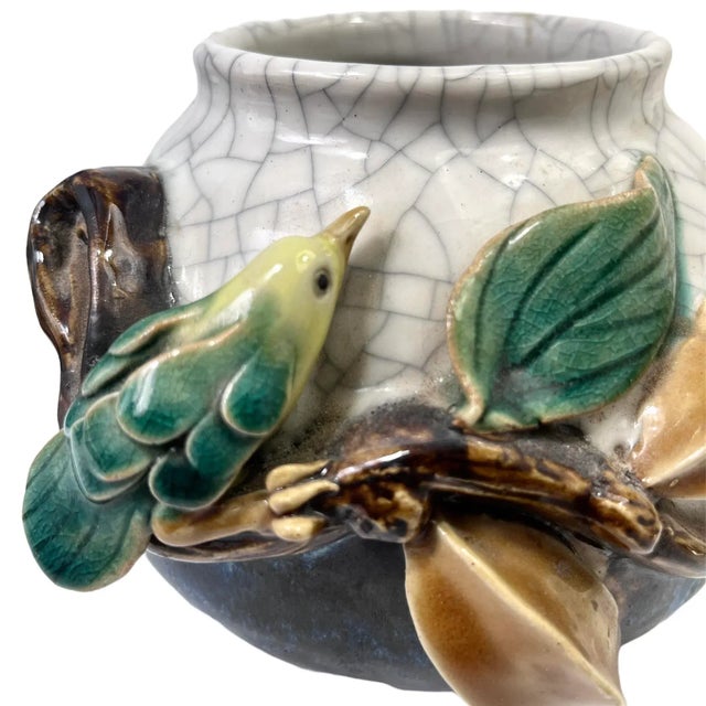 Add a beautiful touch to your decor with this majolica hand-painted crackle glazed ceramic pot in the George Jones style....