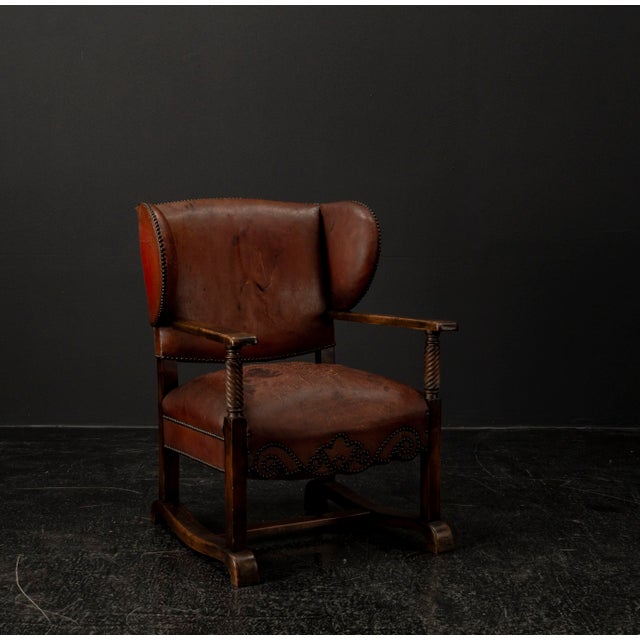 This elegant chimney chair combines historic craftsmanship with functional design. Originally conceived for use by the...