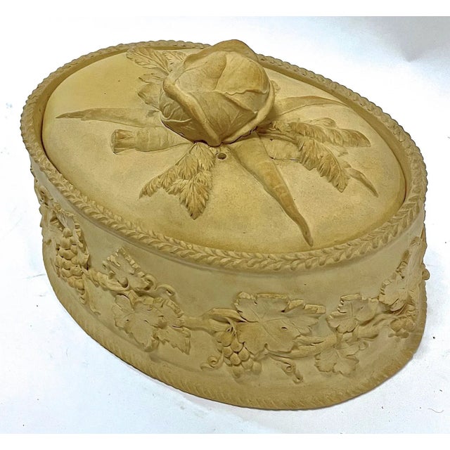 Antique Wedgwood vegetable and grapevine lidded game tureen with lettuce head handle on lid. Grapevine motif in relief...