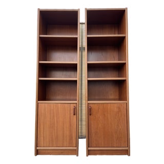 A Pair of Vintage Single-Column Danish Teak Bookcases With Cabinet Storage. Circa 1970s For Sale