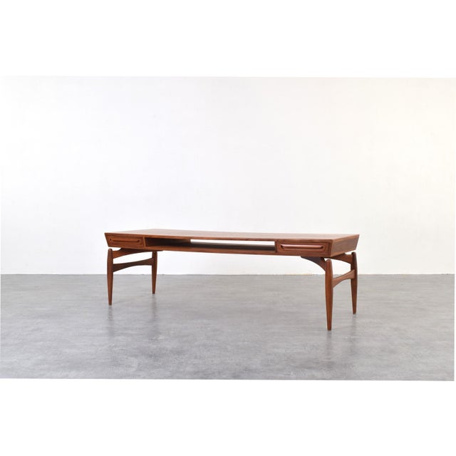 This teak coffee table was designed by Danish designer Johannes Andersen and manufactured in the 1960s by the Swedish...