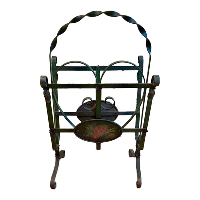 Early Wrought Iron Magazine Rack With a Heart Shaped Design and Painted Floral Medallion For Sale