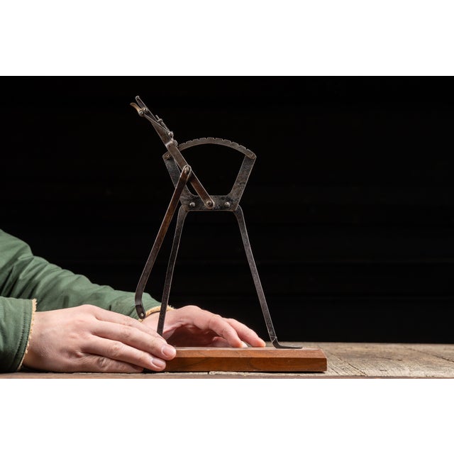 Early 20th-century salesman sample or demonstration model of a mechanical throttle lever, likely representing a control...