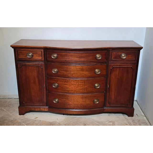 Exquisite 1948 Drexel “Travis Court” Federal Revival Sideboard & China Cabinet. Crafted during Drexel’s golden era, this...