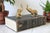 Pair of vintage brass elephant figurines. Makers mark on the bottom of one. Made in Taiwan R.O.C. Minor age wear. Sitting,...