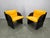 Elegant pair of Italian armchairs from the 1970s designed in a bold space age style. The chairs feature a sculptural...