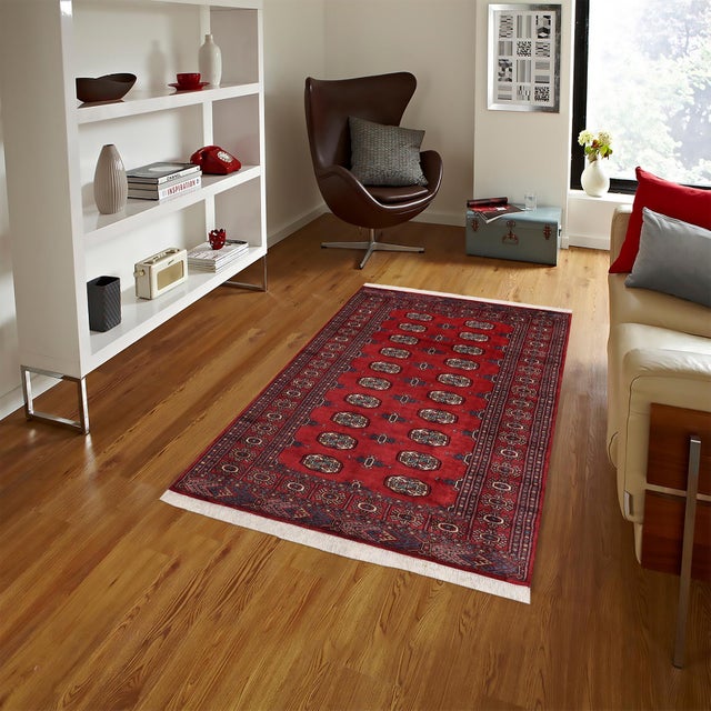 Transform the interior of your home with a beautiful hand-knotted Bokhara rug. Meticulously crafted with intricate...