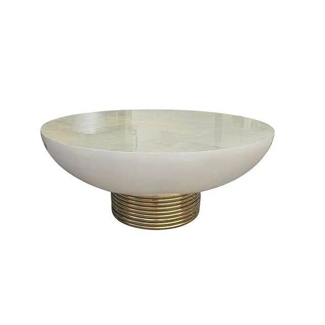 Elegant sofa table, simple and linear but very luxurious, both for the material used to cover the wood, goatskin, and for...