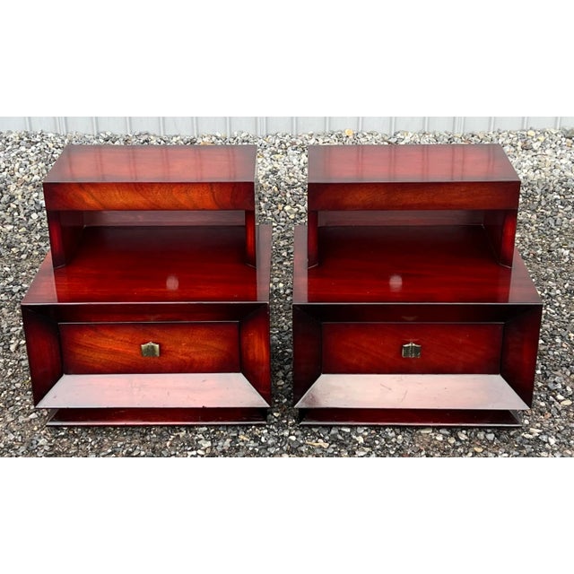 Very nice mid century mahogany Hollywood Regency style nightstands. Simple clean lines with a little Hollywood glamour...