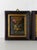 A beautiful pair of antique oil paintings on copper depicting elegant floral still lifes in classical urns. Richly...