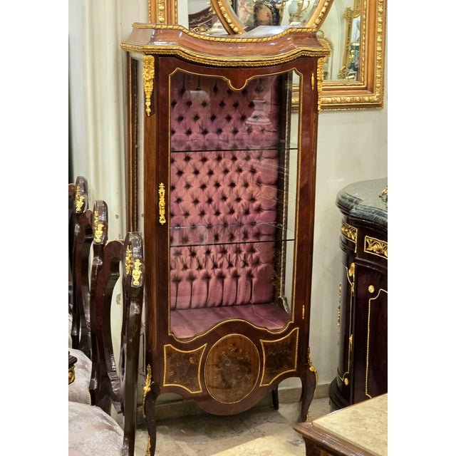 Stunning French vitrine. Has been refinished in Italy. Has a beautiful gold details in the door. This piece is in great...