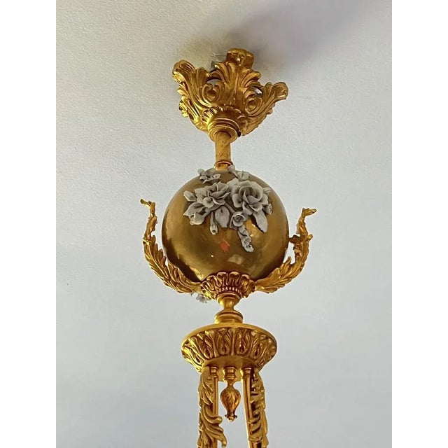 Great chandelier two lights in brass and porcelain, Italy, 80s Working and intact, found in a noble apartment. Building on...