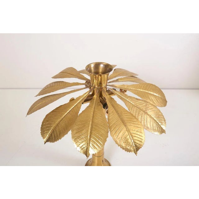 Very rare and elegant floor lamp with multiple rhubarb leaves by the Italian designer Tommaso Barbi. The lamp is made of...